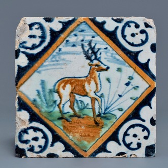 A polychrome Dutch Delft maiolica tile with a deer, ca. 1600